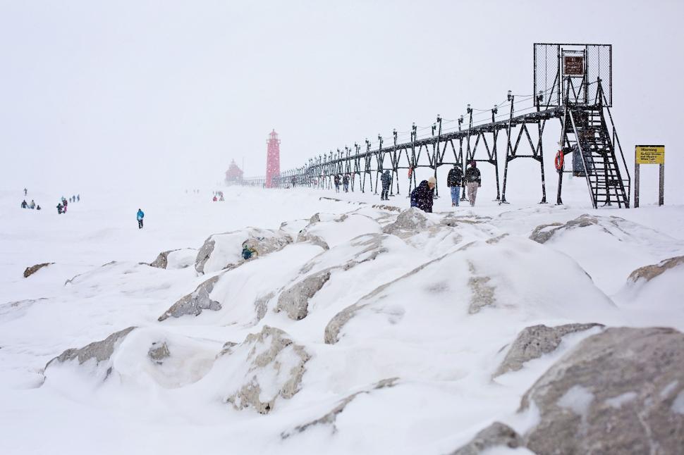 Free Image of People and Pier in Snow 