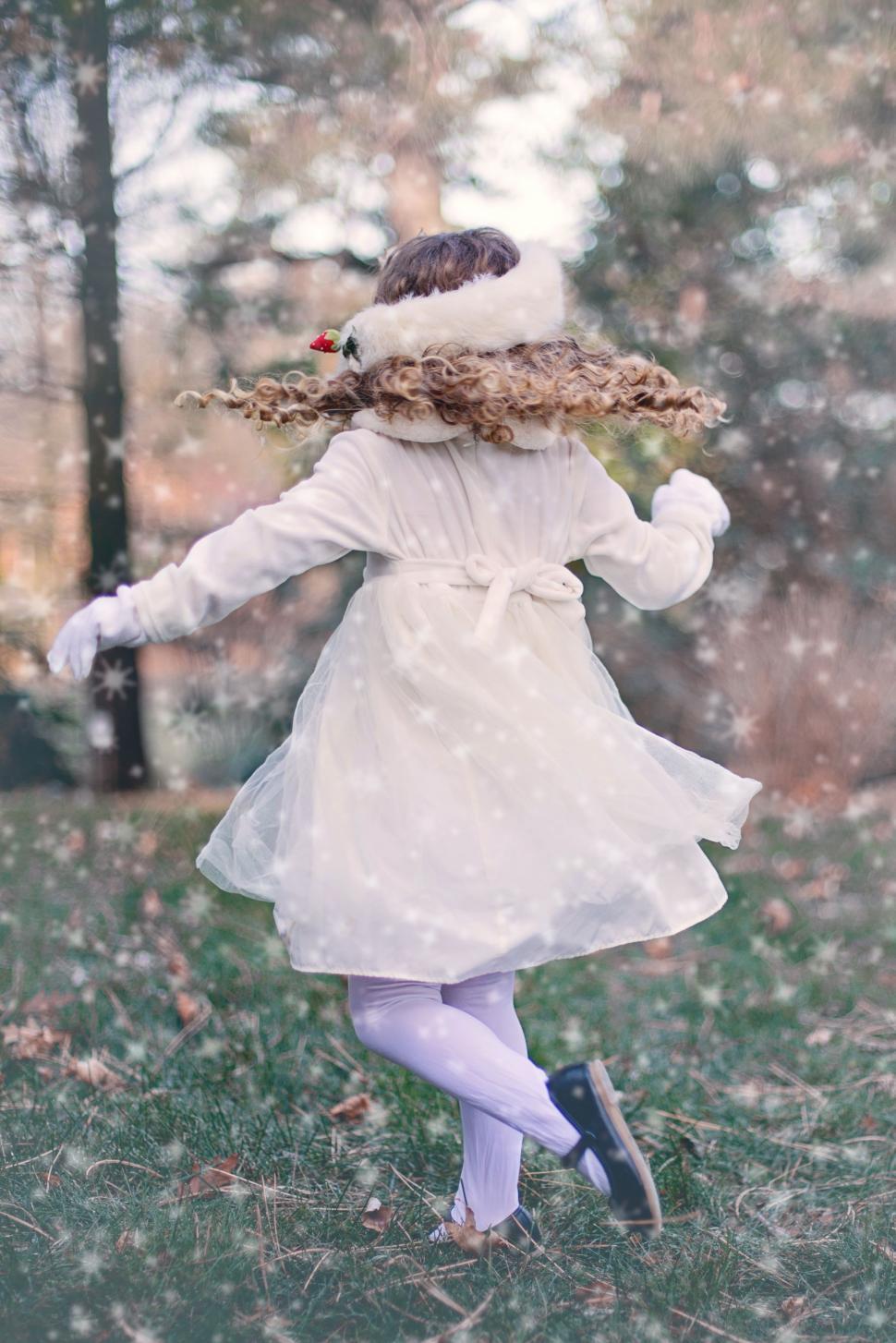 Free Image of Little Girl dancing in the meadow 