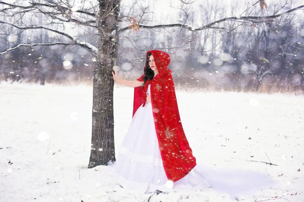 Download Free Stock Photo of Woman in red riding hood and snow 