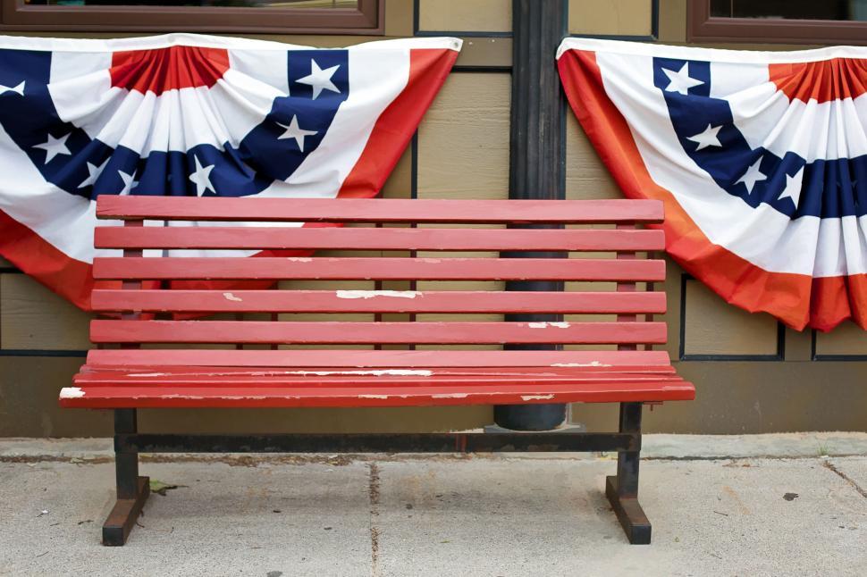 Free Image of Bench and American flag bunting 