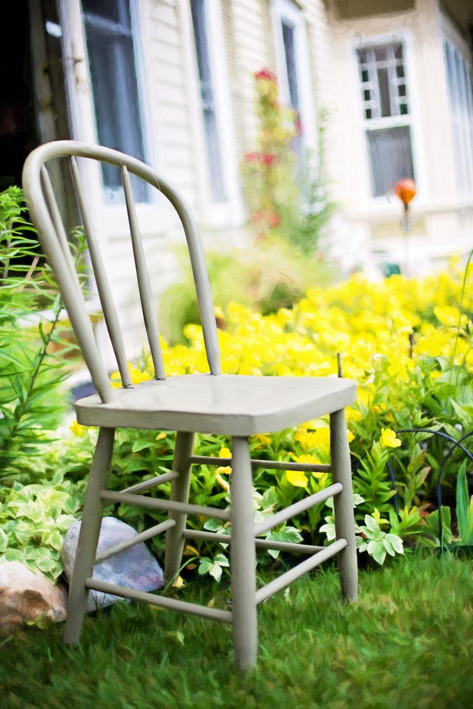 Free Image of Chair and flowers  