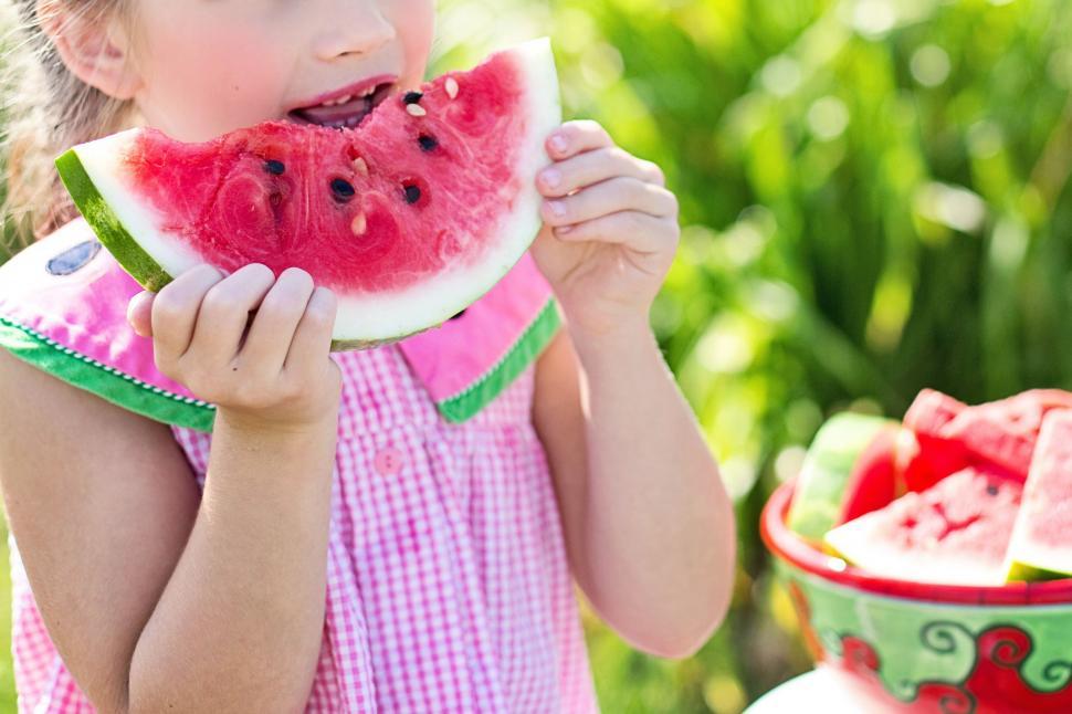 Free Image of Little Girl With Watermelon  