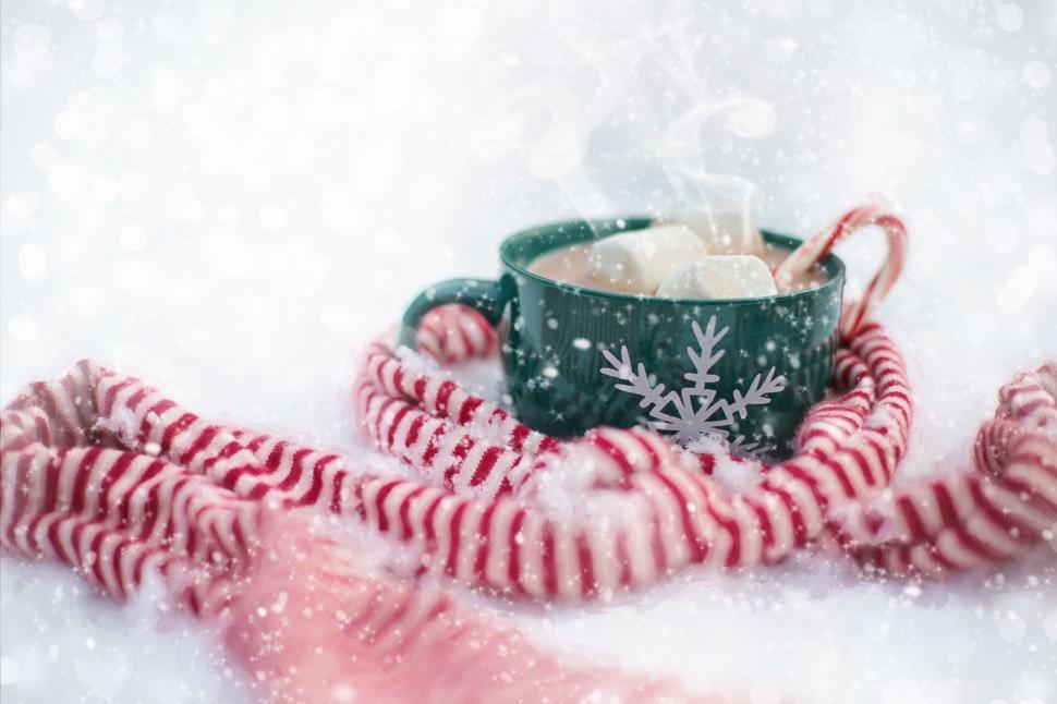 Free Image of Chocolate Cup With Scarf in Snowfall 