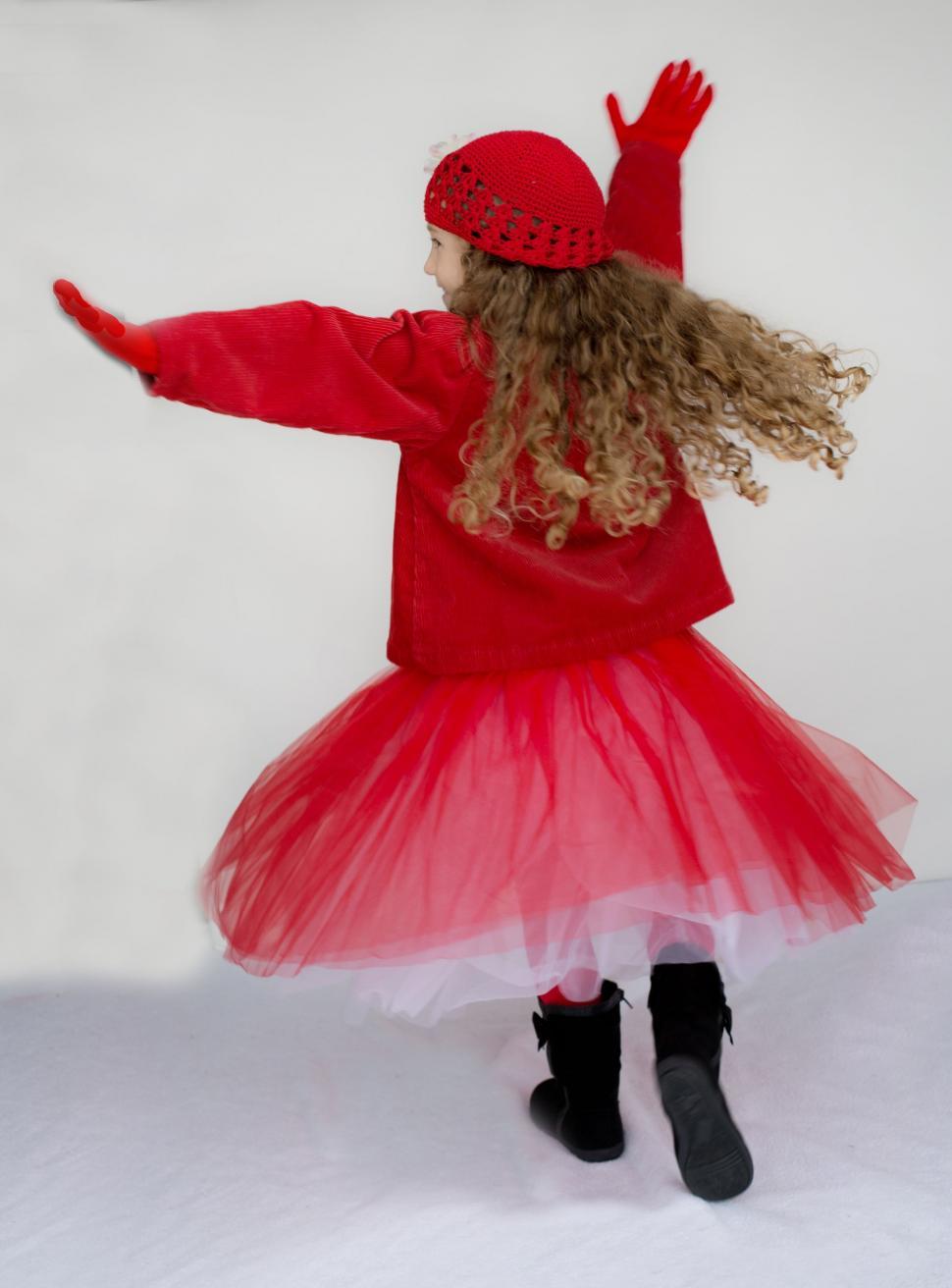 Free Image of Little Girl in red tutu dress  