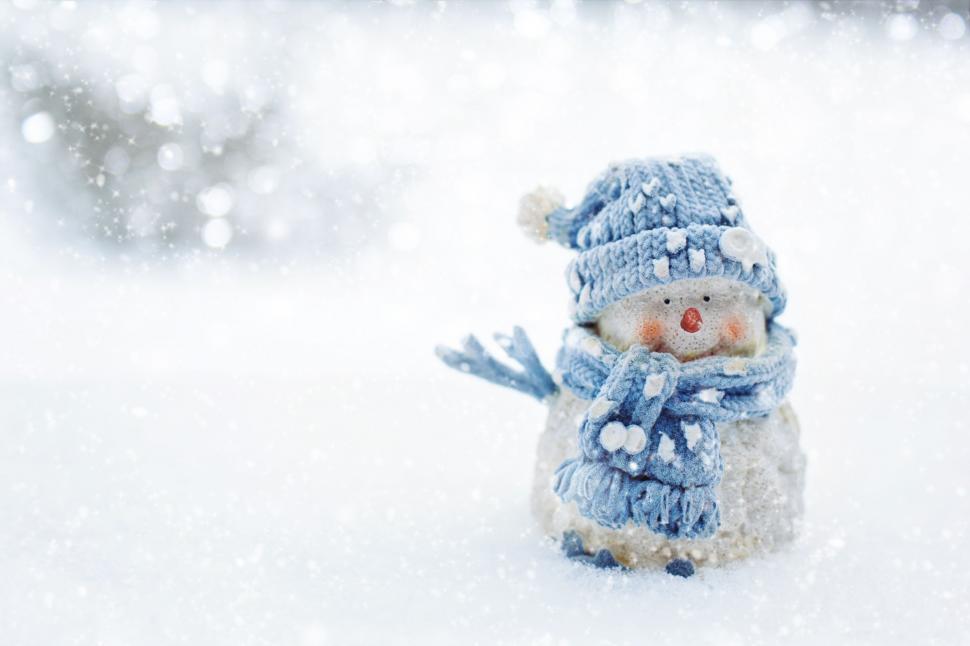 Free Image of Snowman in blue cap 
