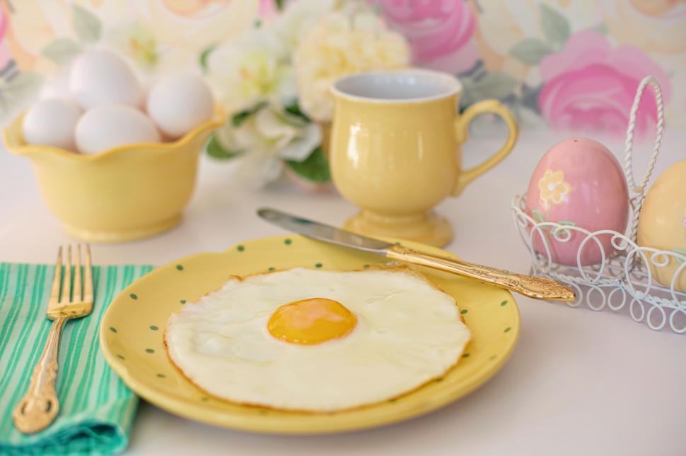 Free Image of Fried egg with knife and fork - Breakfast  