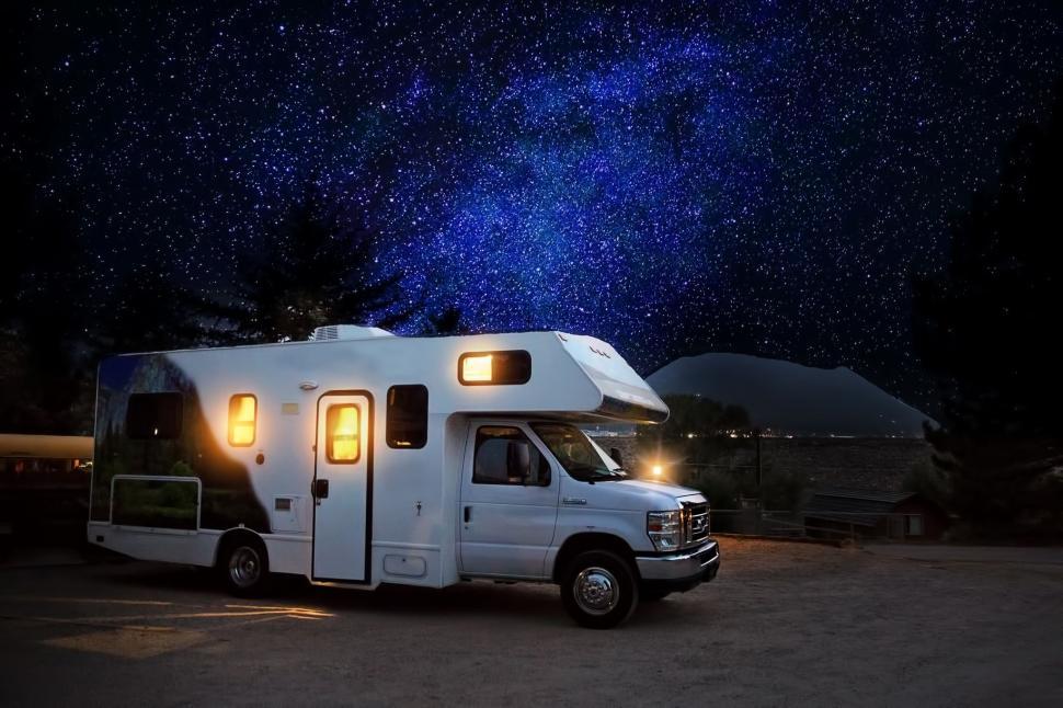Download Free Stock Photo of Camper Van and starry night sky 