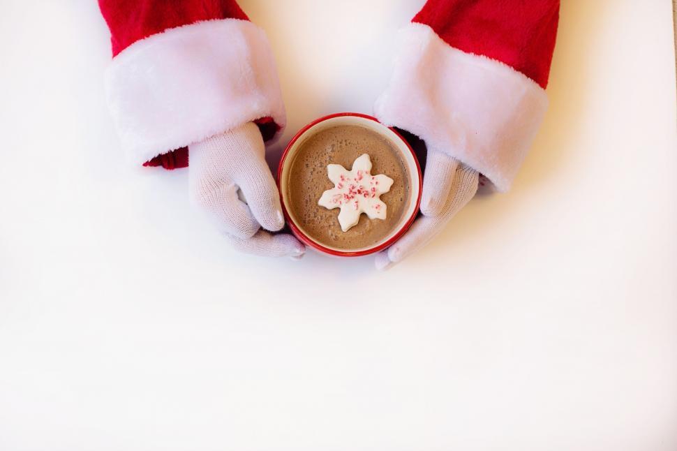 Free Image of Santa Hands and Coffee - Copy Space  