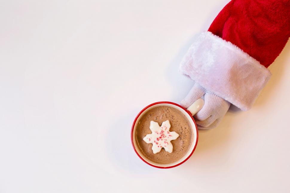 Free Image of Santa Hand and Coffee 