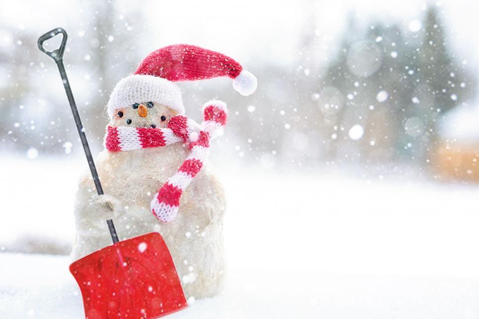 Free Image of Snowman in red Santa hat 