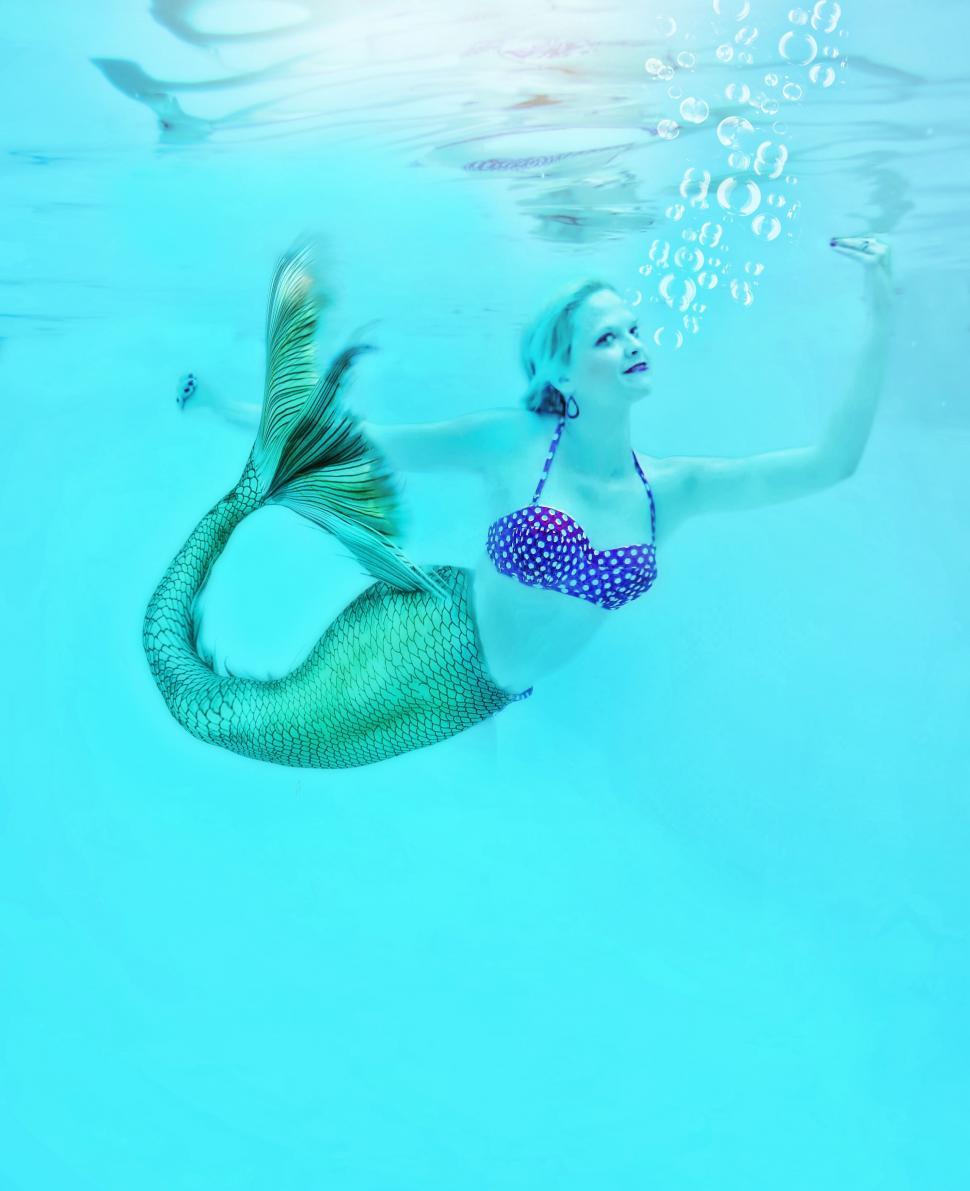 Free Image of Mermaid in water - looking at camera  