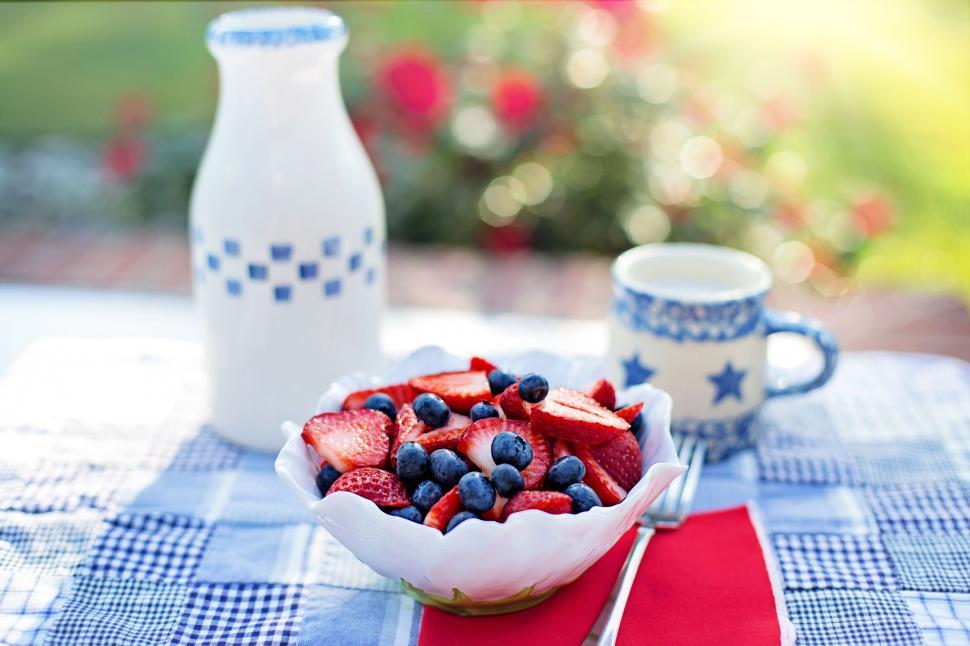 Free Image of Sliced strawberries and blueberries 