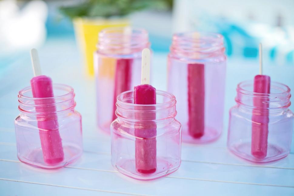Free Image of Popsicles in glass jars  
