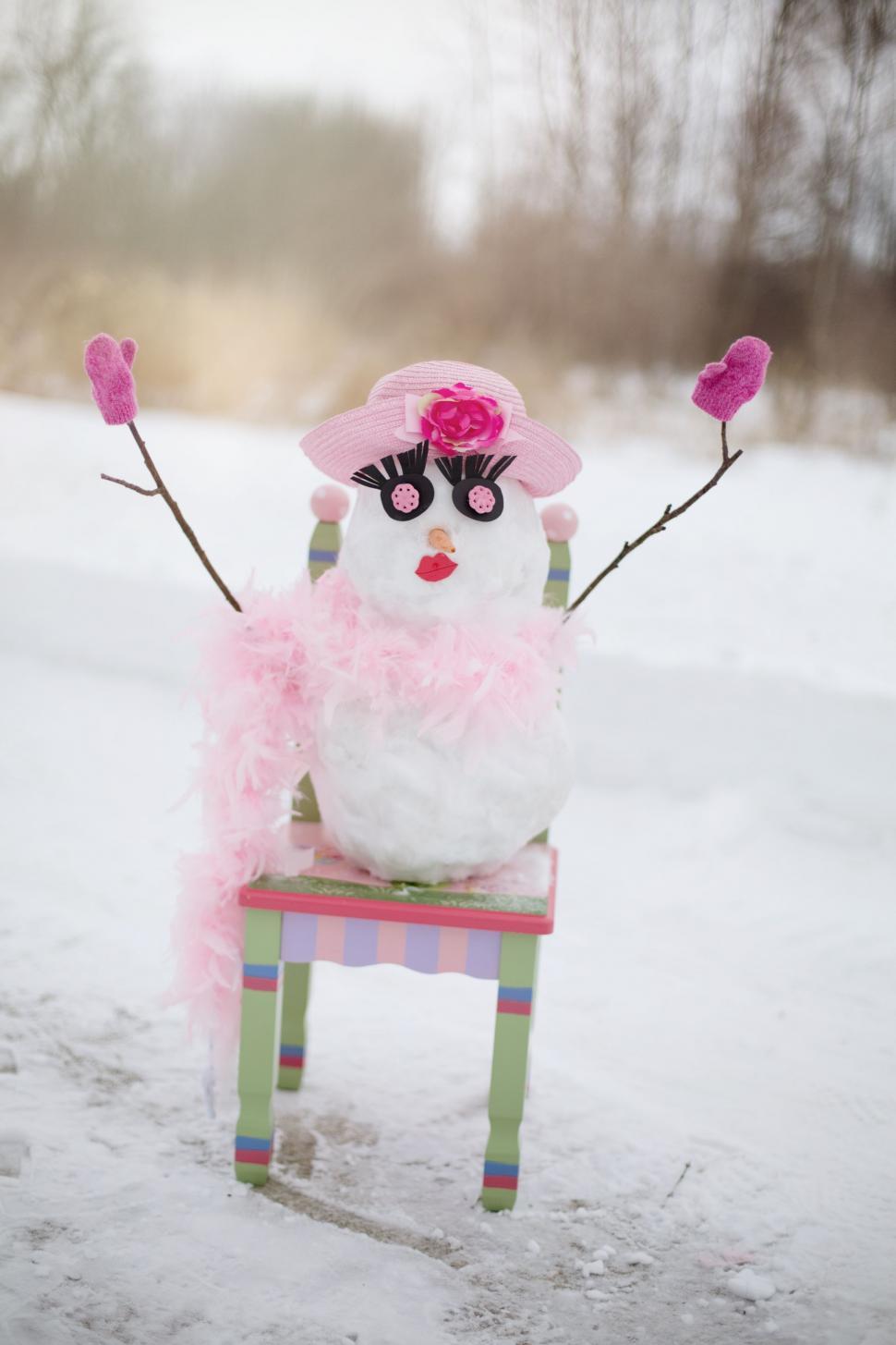 Free Image of Snowman in pink hat  