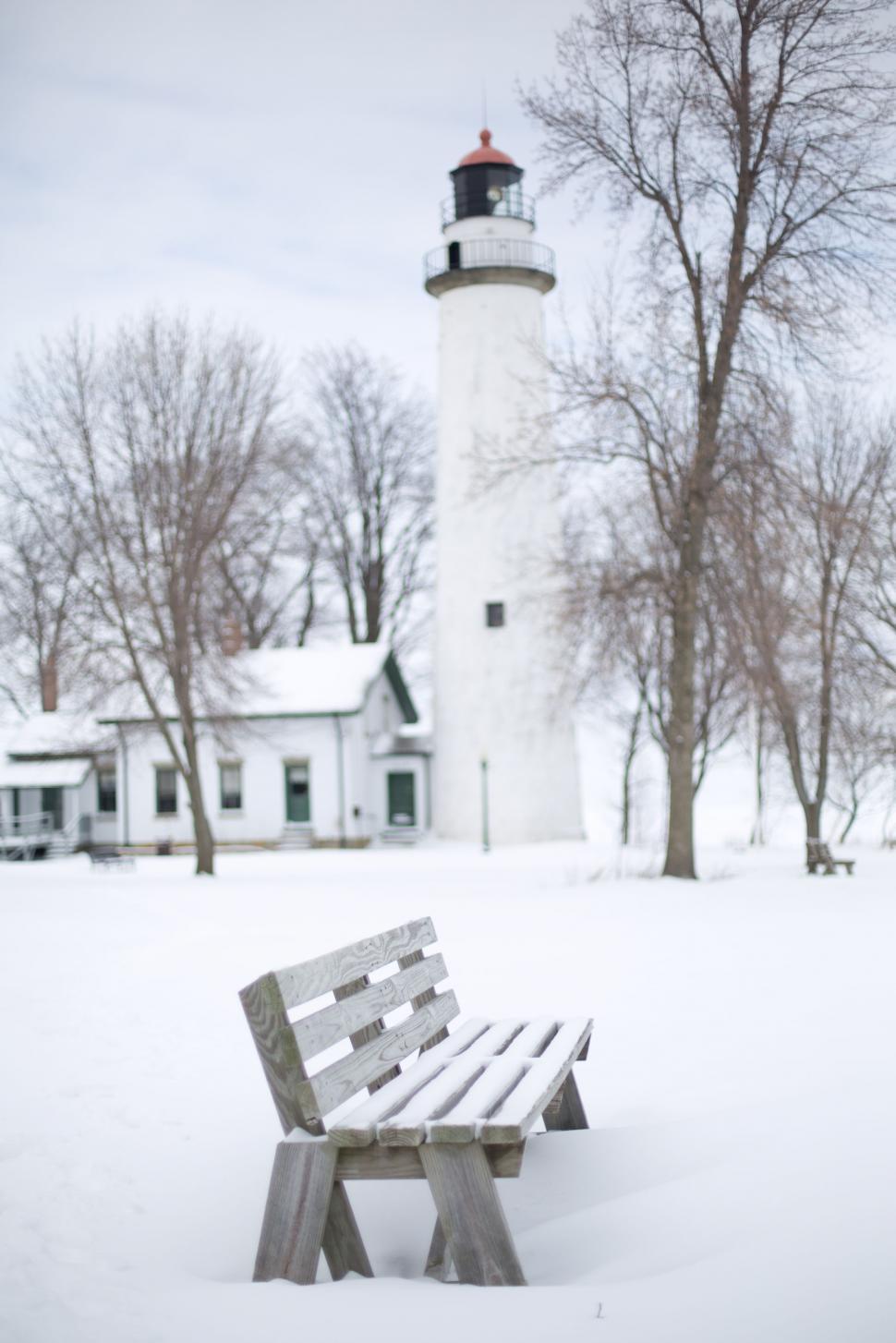 Free Image of Lighthouse with trees and snow 