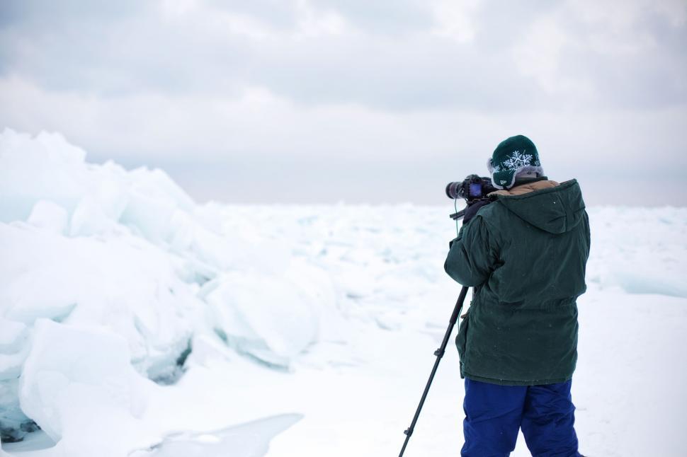 Free Image of Frozen Lake and Photographer  