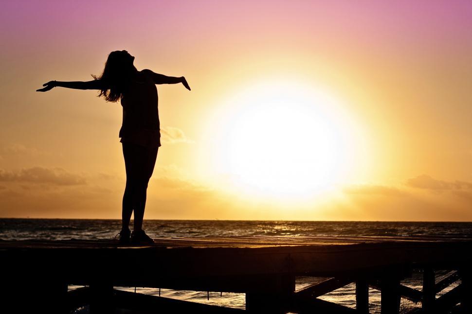 Free Image of Woman and Sunset 