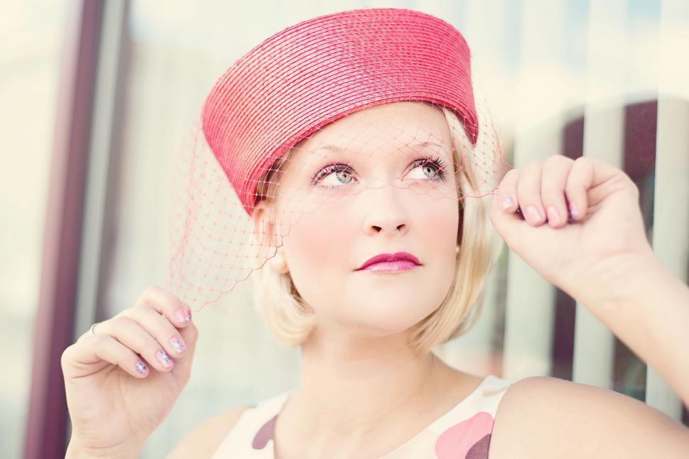 Free Image of Stylish Woman in pink hat with veil - Looking Up  