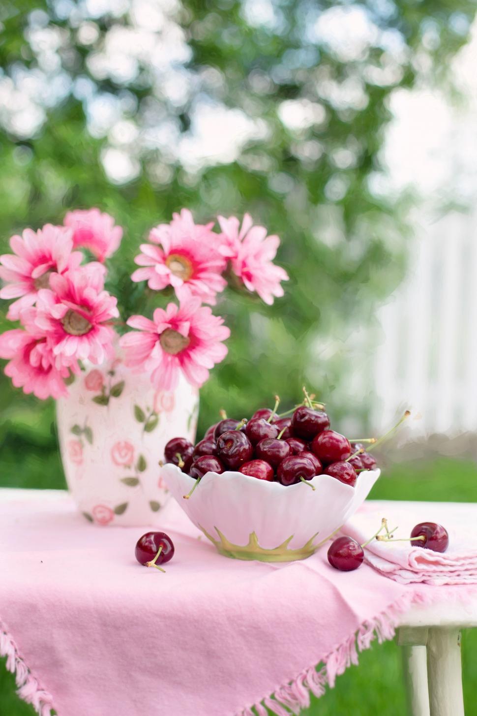 Free Image of Cherries and flowers  