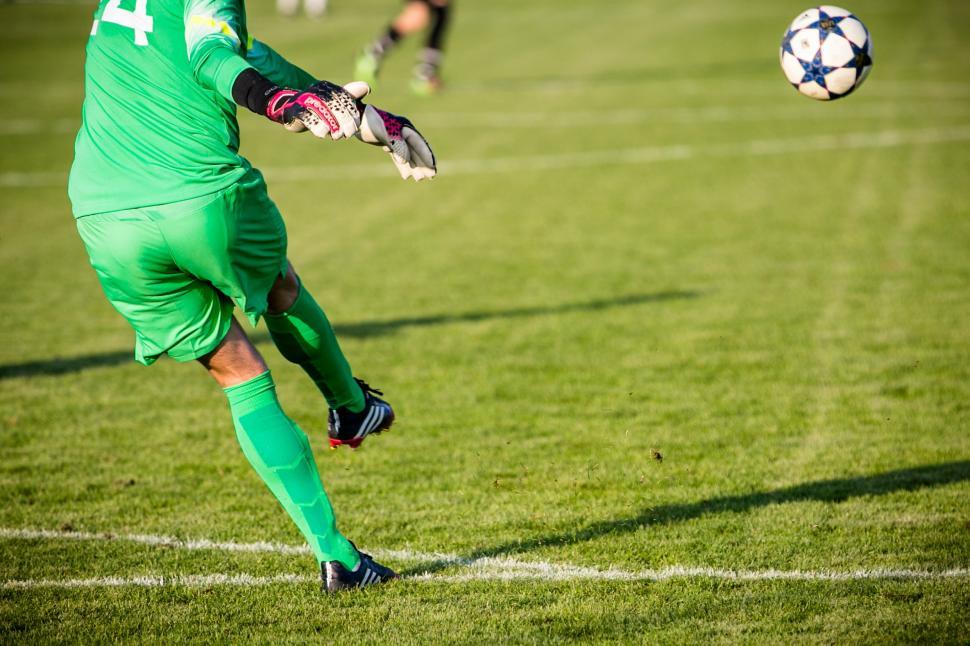 Free Image of Soccer goalkeeper kicks out the ball 