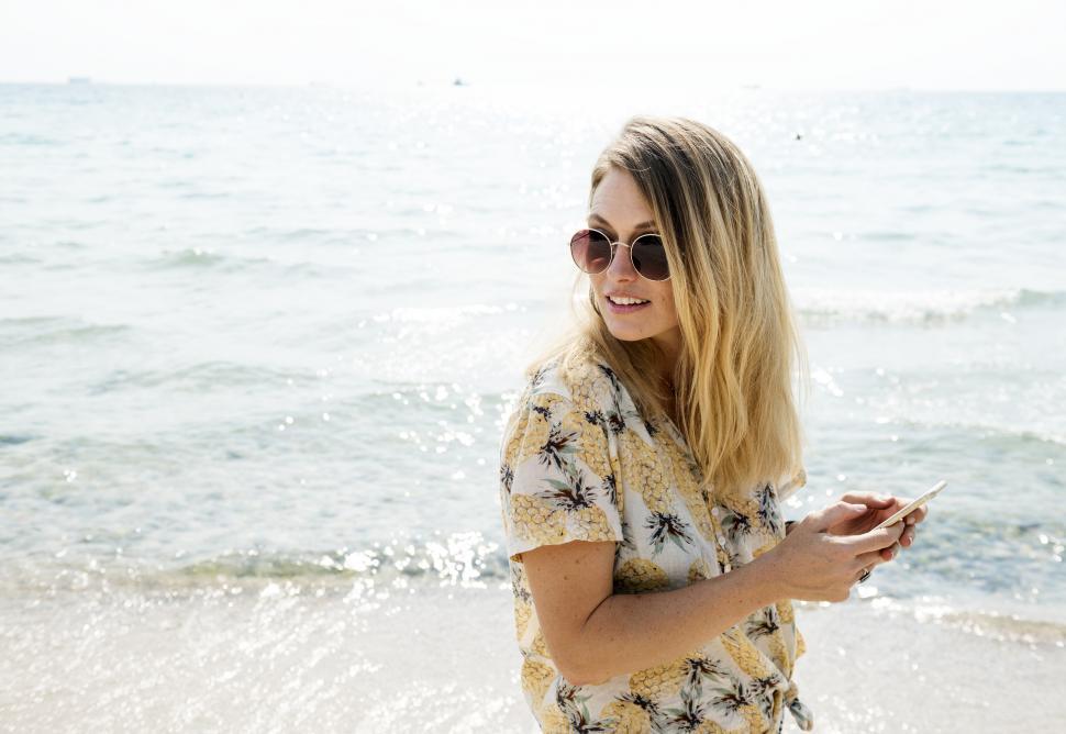 Free Image of A young Caucasian woman on the beach 
