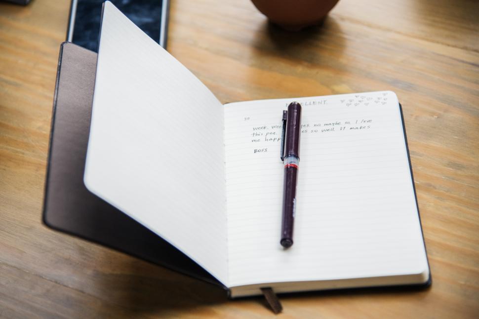 Free Image of Close up of a pen on the notebook 
