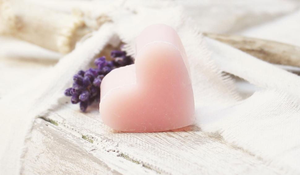 Free Image of Heart-shaped soap with flowers 