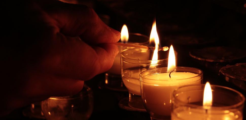 Free Image of Lighting Candles 
