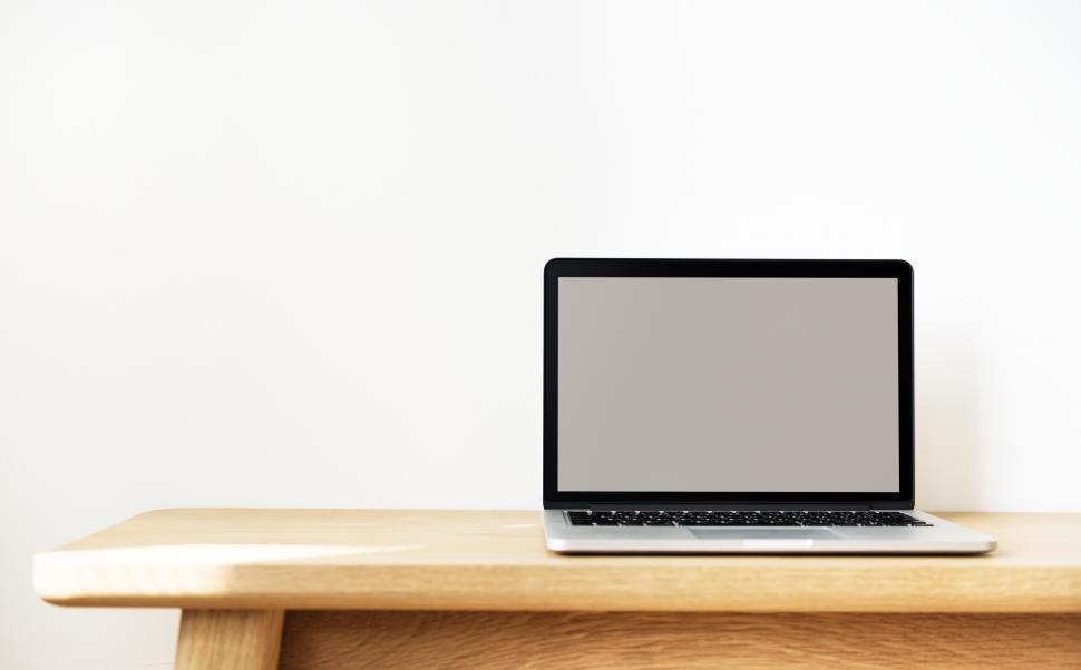 Free Image of Close up of a, open blank laptop on the table 