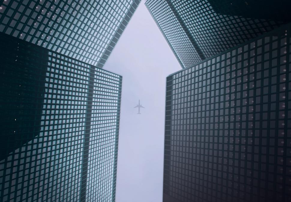 Free Image of Buildings From the Ground Forming Arrow  