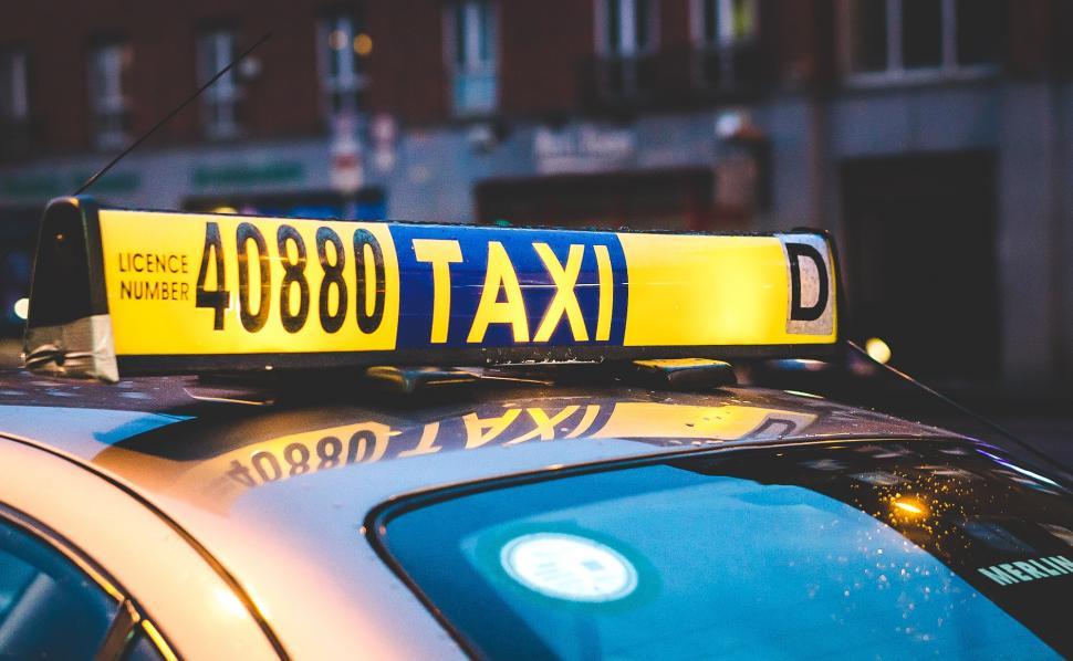 Free Image of Close up of a taxi sign 