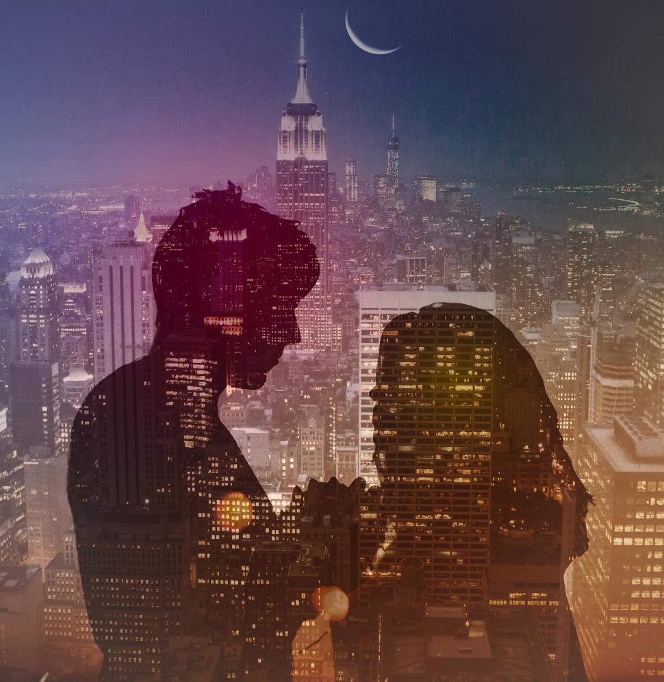 Free Image of Romantic Couple over City at Night - Double Exposure Effect 