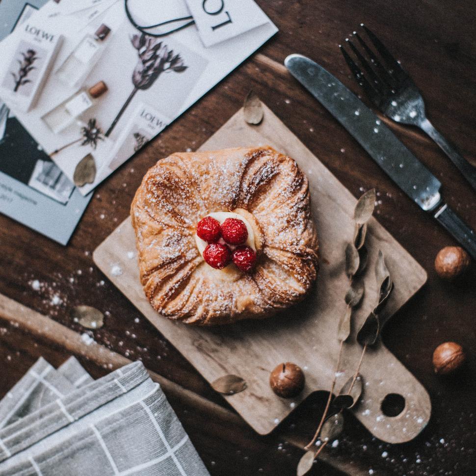 Free Image of Danish Pastry with strawberries and icing 