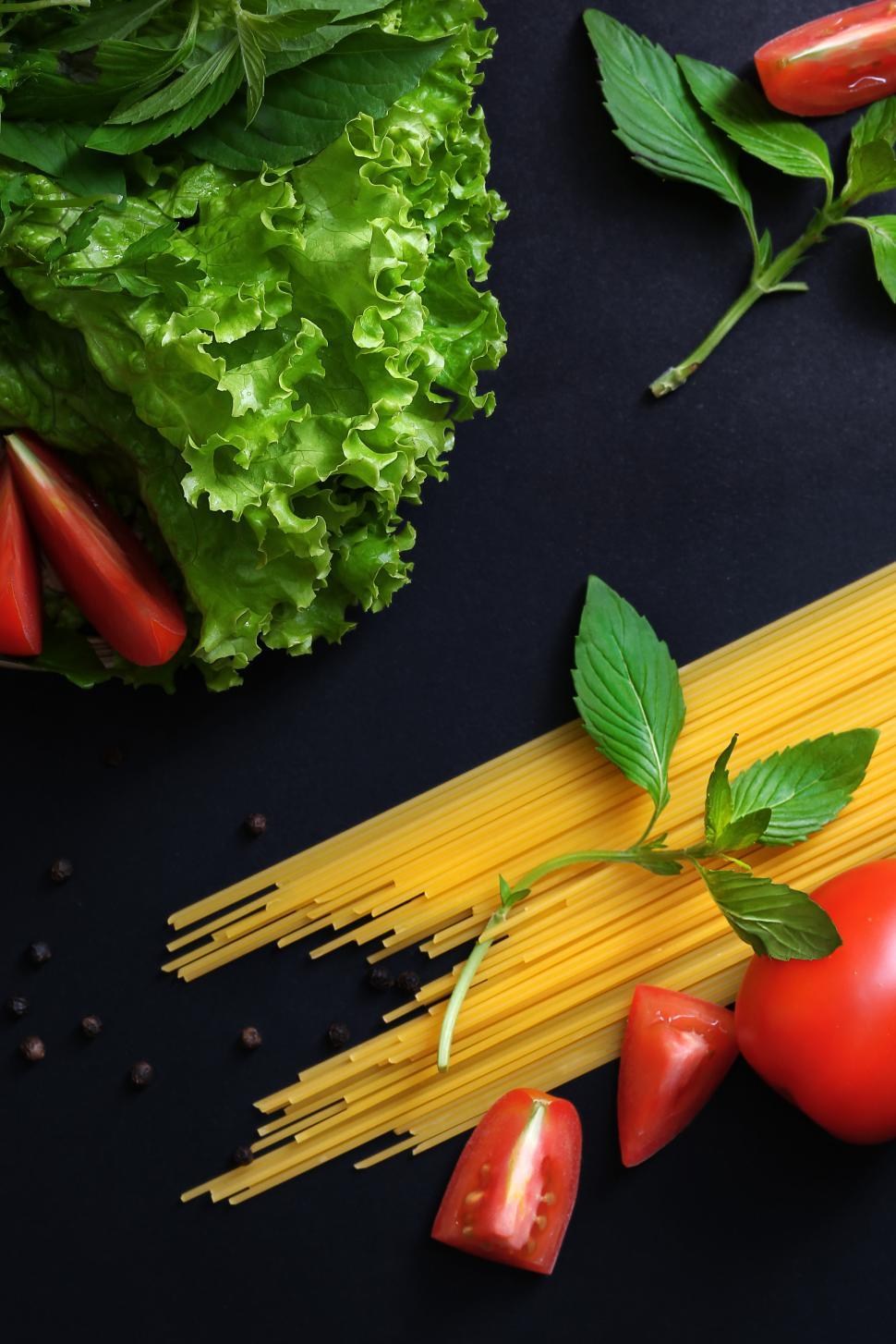 Free Image of Pasta spaghetti with sauce ingredients 