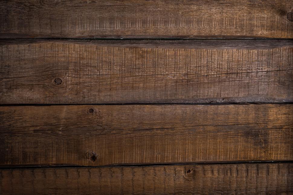 Free Image of Close up of rough hewn wood board texture 