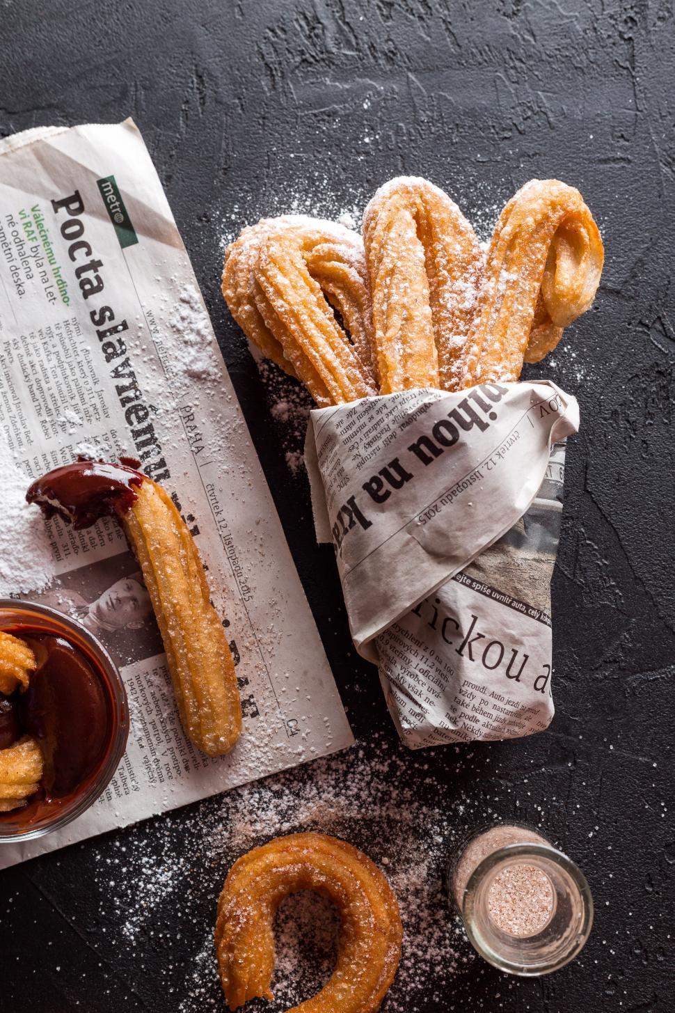 Free Image of Freshly Baked Churros with glass of coffee 