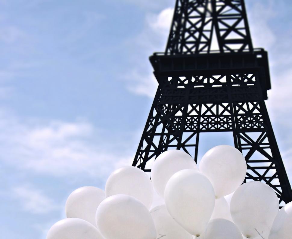 Free Image of Eiffel Tower with White Balloons 