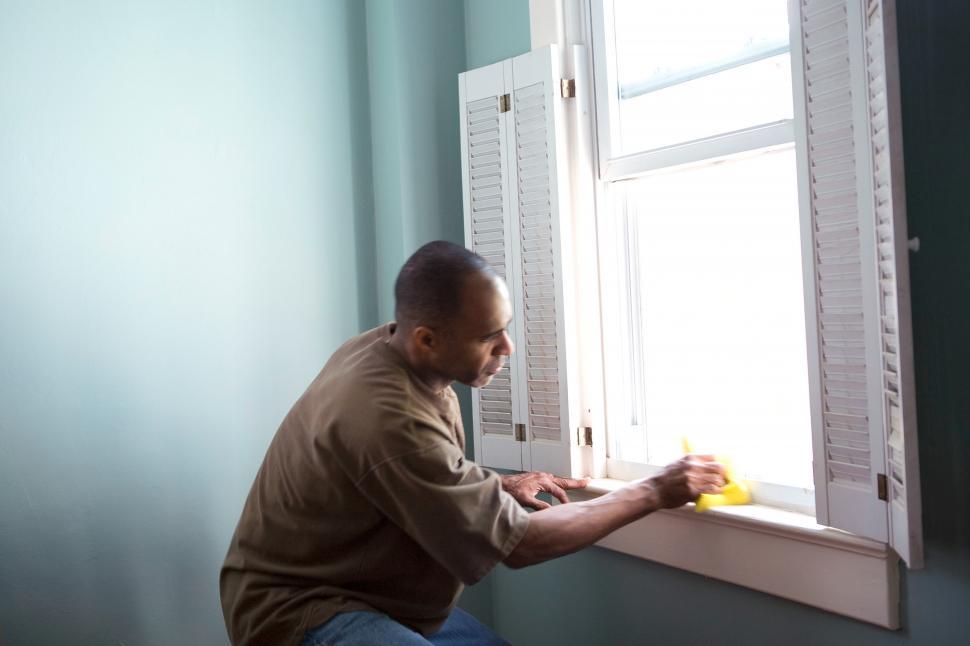Free Image of Man Cleaning Interior Surfaces 