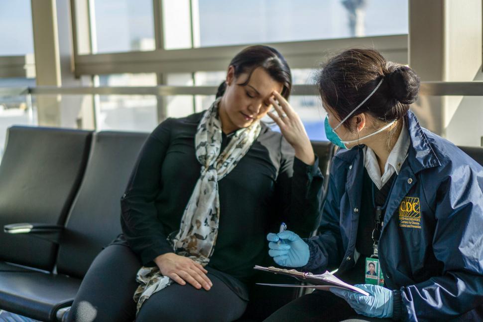 Free Image of Assessing a sick traveler 