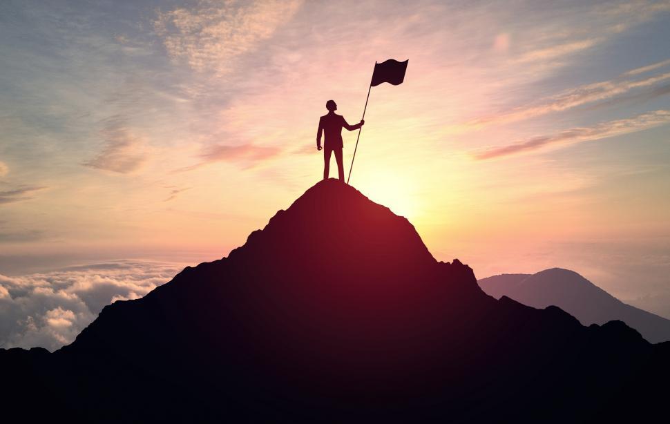 Download Free Stock Photo of Man with Flag on Top of Mountain 