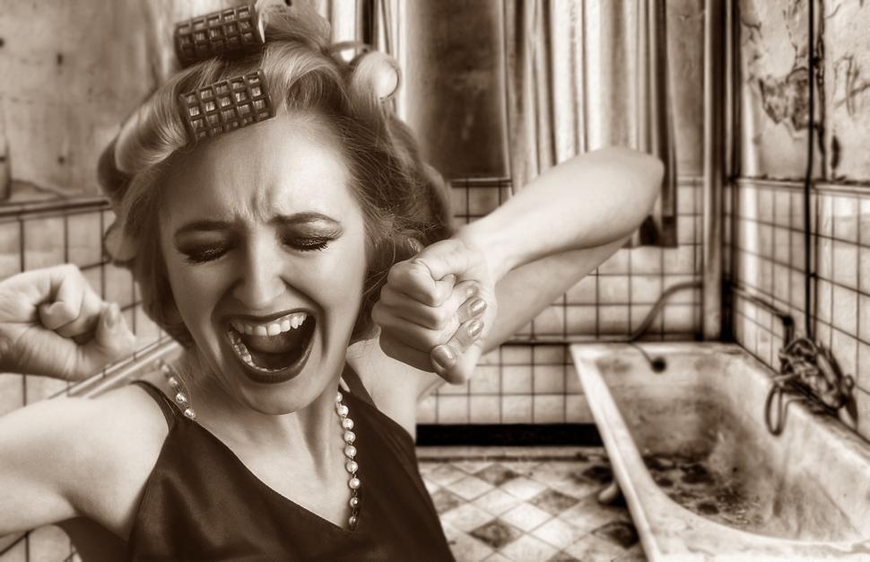 Free Image of Woman upset with filthy bathroom 