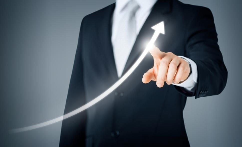 Download Free Stock Photo of Business Growth Concept - Businessman Pointing to Upward Arrow 