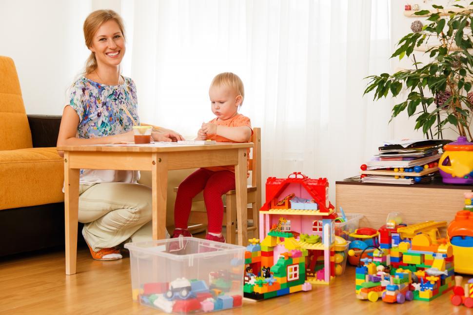 Free Image of Mother and her child home in playroom 