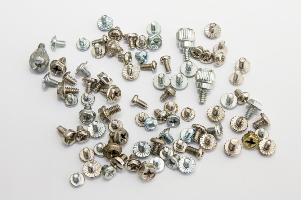 Free Image of Bolts strewn with white background screw 