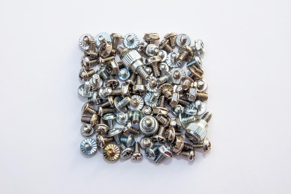 Free Image of A collection of bolts form a square  