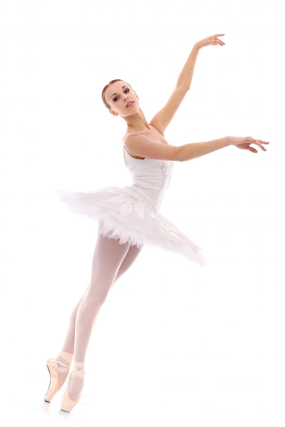 Download Free Stock Photo of Lovely ballerina dancing against white background 