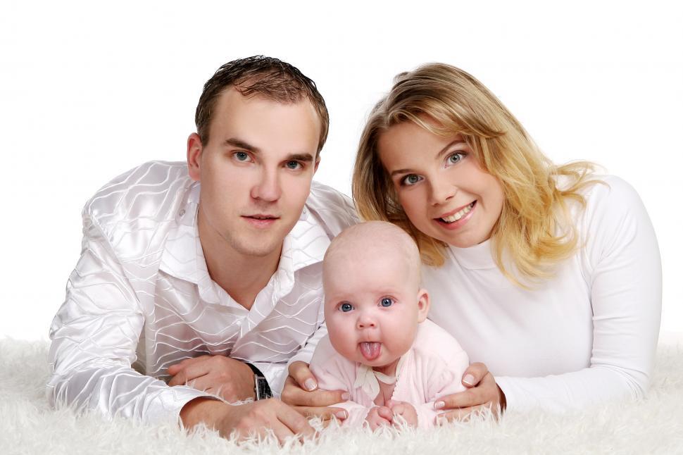 Free Image of a happy family with young baby 