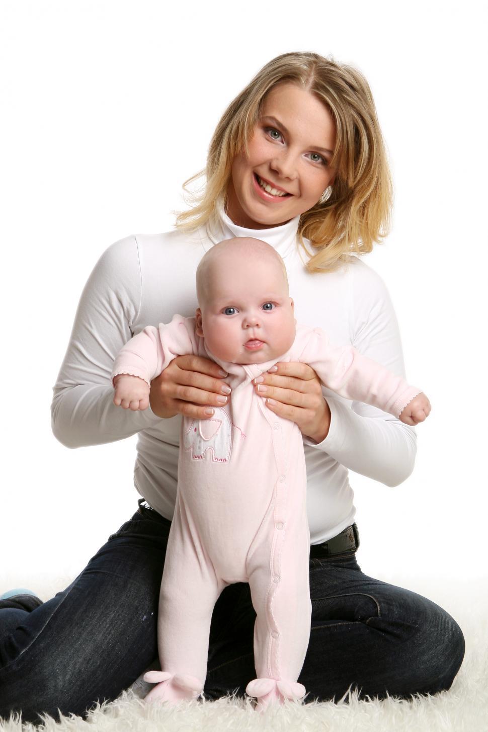 Free Image of a young and mother with baby in pink 