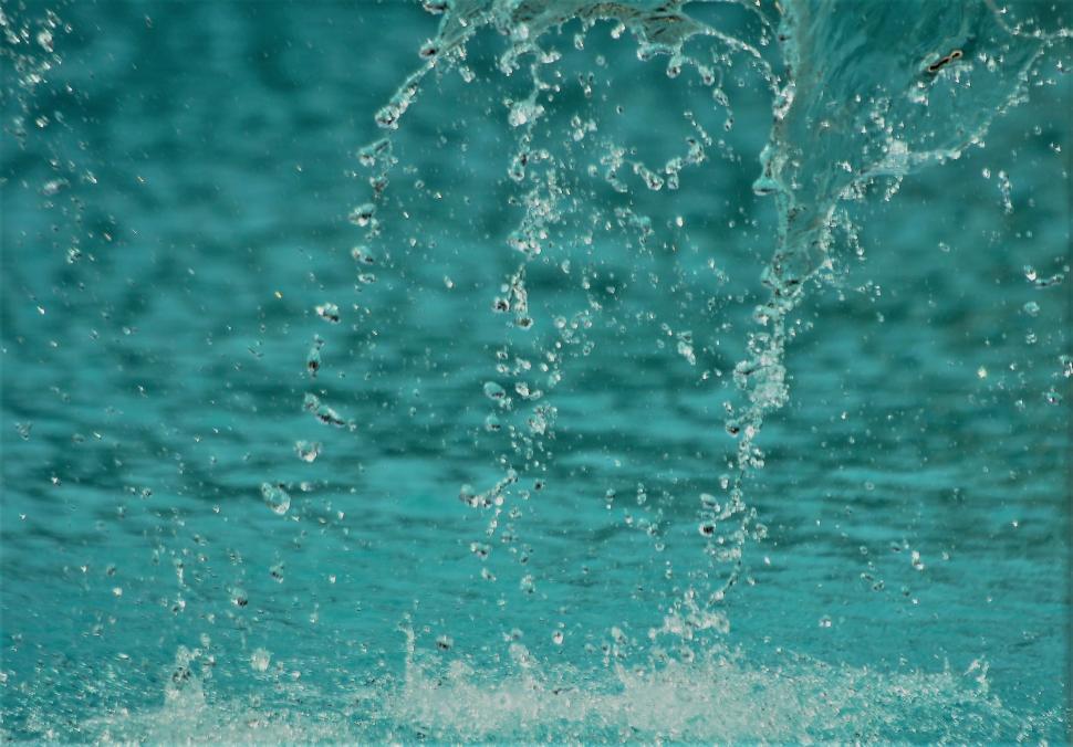 Free Image of Turquoise Water Splash Background  