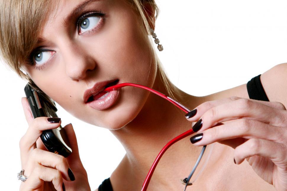Free Image of Young woman calling by phone 